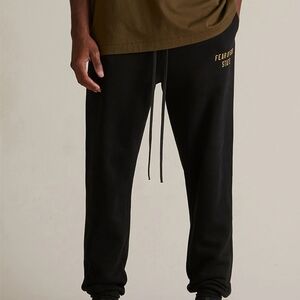 Fear of God Black Joggers with Gold Detail